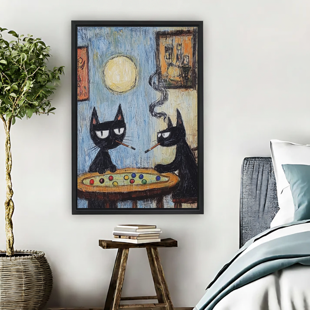 Funny Billiard Room Cats canvas art framed beside a bed with muted blue bedding and a potted tree.