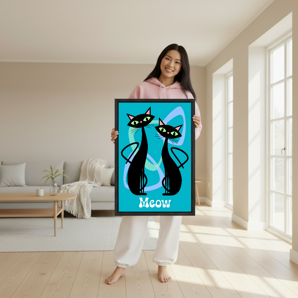 Retro Black Cats Canvas Wall Art held in a black frame by a woman wearing pink.
