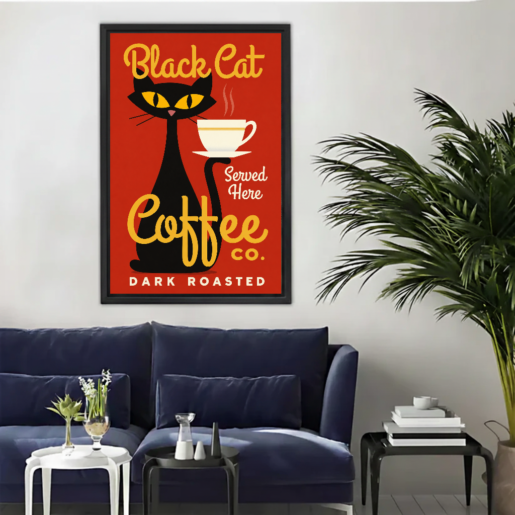 Black Cat Coffee Canvas Wall Art framed above a navy sofa beside a leafy palm.