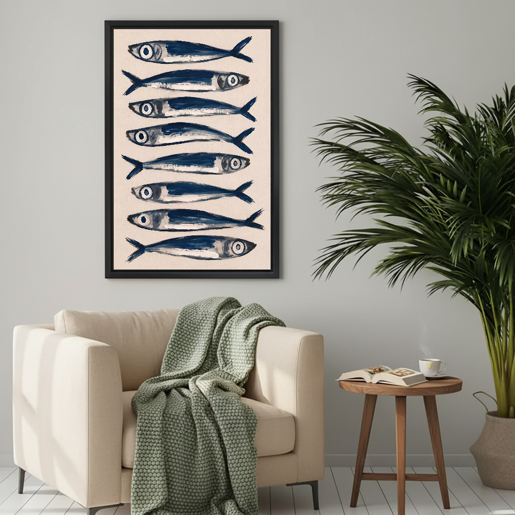 Blue Sardines Canvas Wall Art framed beside a cream armchair with a green throw.