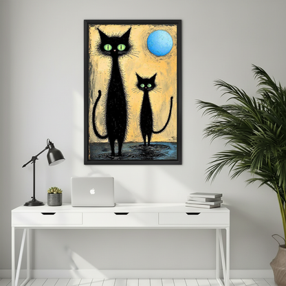 Black Cats Moon Canvas Wall Art framed above a white desk with laptop and black lamp.