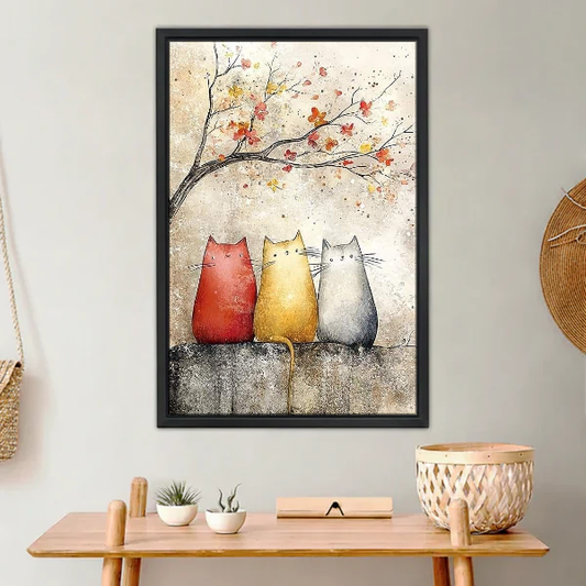 Blossom Cats Canvas Wall Art framed above a light wood console with cacti.