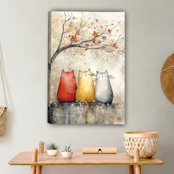 Blossom Cats Canvas Wall Art unframed above a light wood console and woven basket.