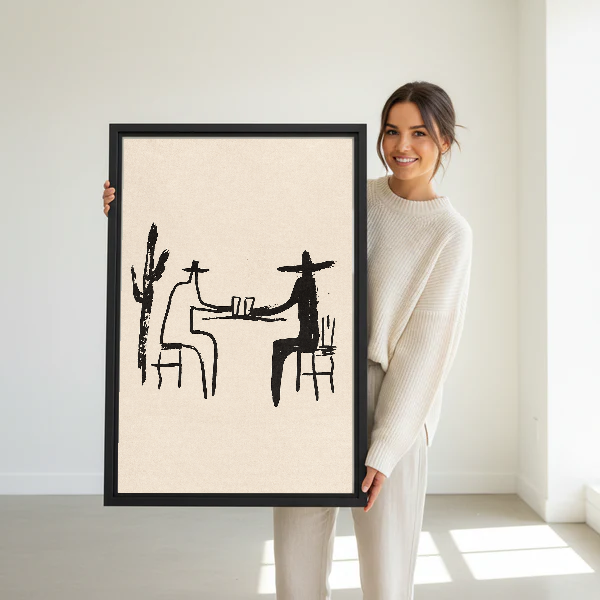 Cowboy Toast Canvas Wall Art held in a black frame by a standing woman in white.