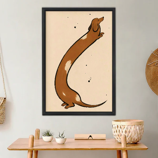 Stretching Dachshund Canvas Wall Art framed above a light wood console with cacti.