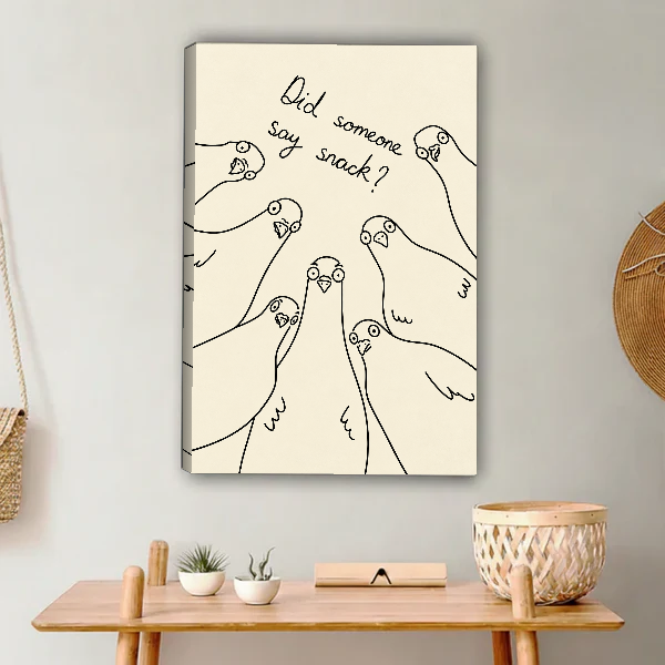 Snack Pigeons Canvas Wall Art unframed above a light wood console and woven basket.
