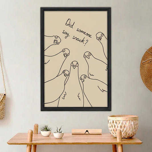 Snack Pigeons Canvas Wall Art framed above a light wood console with cacti.