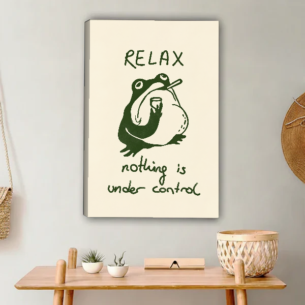 Relax Frog Canvas Wall Art unframed above a light wood console and woven basket.