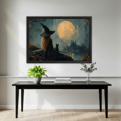 Moonlit Witch Canvas Wall Art framed above a black console with small green plants.