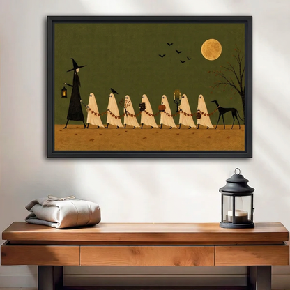 Ghost Parade Canvas Wall Art framed above a wood console with linen and a lantern.
