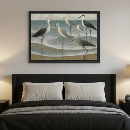 Coastal Gulls Canvas Wall Art framed above a charcoal bed with neutral pillows.