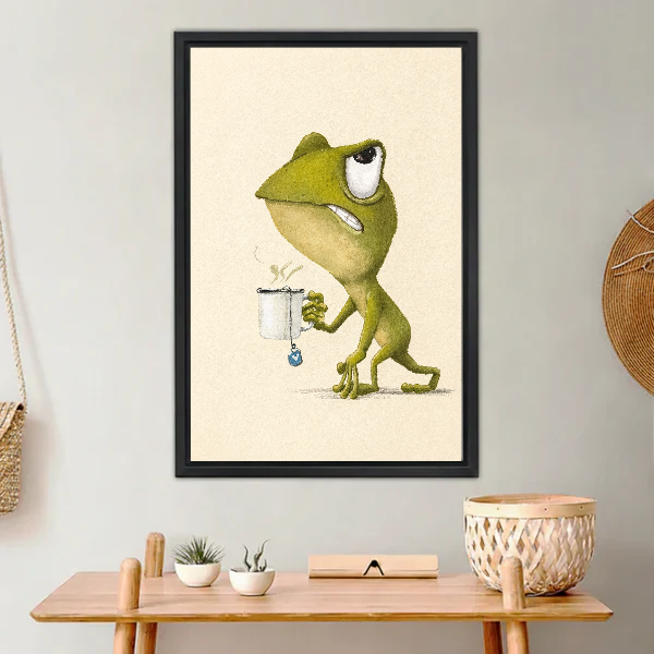 Sleepy Frog Canvas Wall Art framed above a light wood console with cacti.