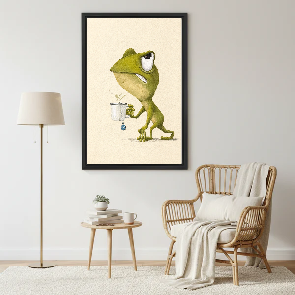 Sleepy Frog Canvas Wall Art framed beside a wicker armchair with floor lamp.
