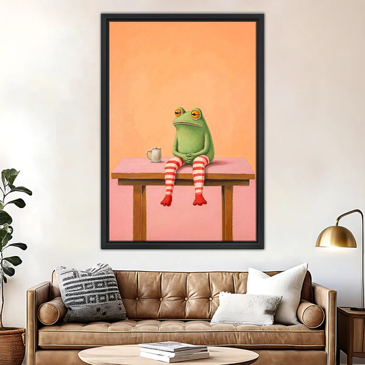 Coffee Frog Canvas Wall Art framed above a leather sofa beside a brass lamp.