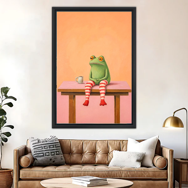 Coffee Frog Canvas Wall Art framed above a leather sofa beside a brass lamp.