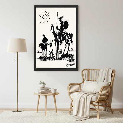 Don Quixote Canvas Wall Art framed beside a wicker armchair with floor lamp.