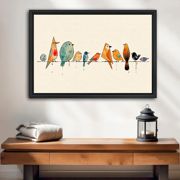 Birds Branch Canvas Wall Art framed above a wood console with linen and a lantern.