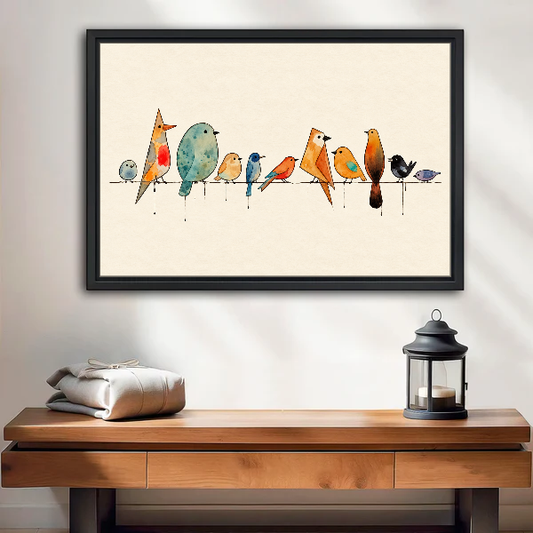 Birds Branch Canvas Wall Art framed above a wood console with linen and a lantern.