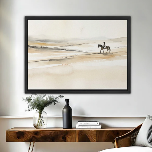 Quiet Rider Canvas Wall Art framed above a wooden console with black and white vases.