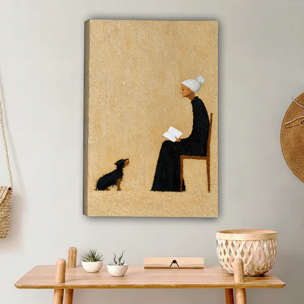 Reading Companions Canvas Wall Art unframed above a light wood console and woven basket.