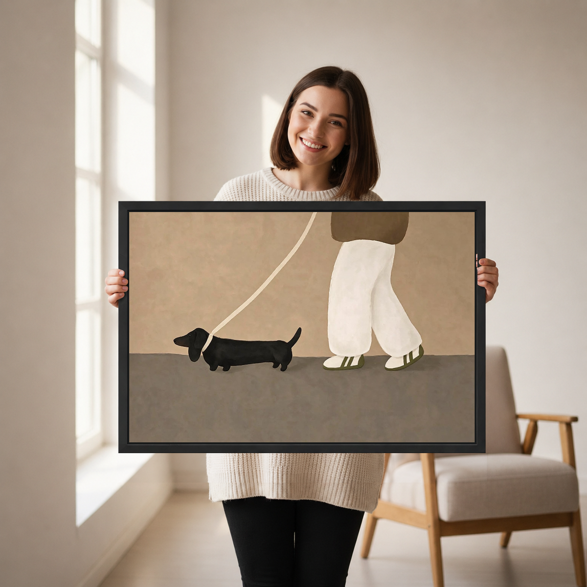 Dachshund Stroll Canvas Wall Art held in a black landscape frame by a standing woman.