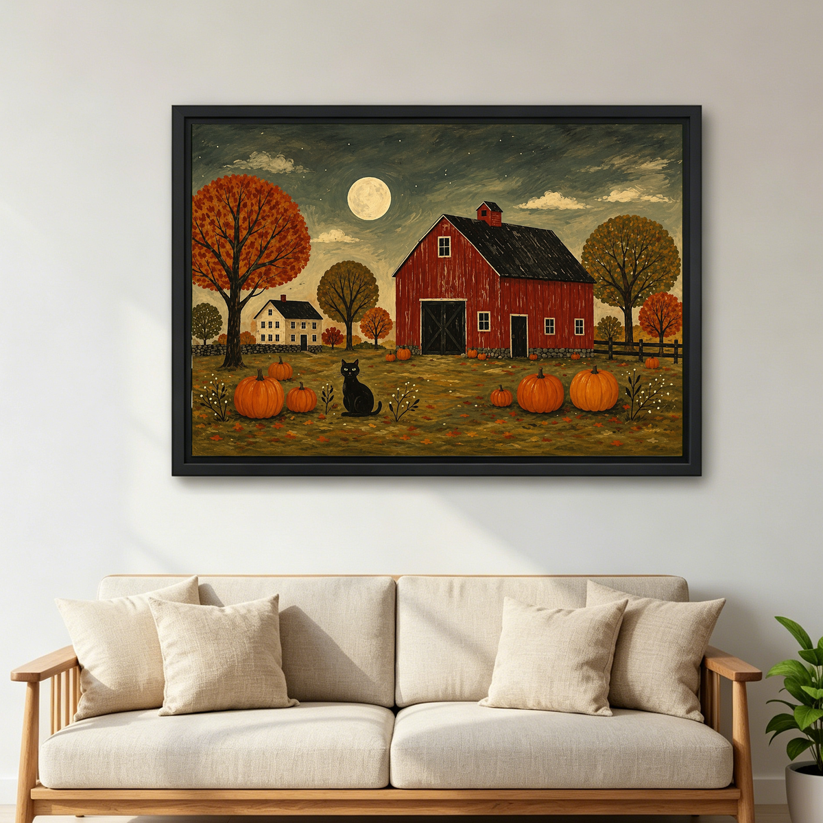 Red Barn Canvas Wall Art framed above a cream sofa with wooden arms.