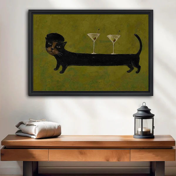 Cocktail Cat Canvas Wall Art framed above a wood console with linen and a lantern.
