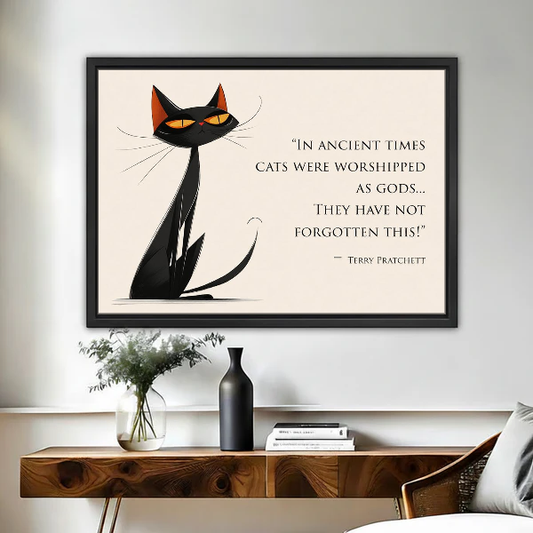 Cat Quote Canvas Wall Art framed above a wooden console with black and white vases.