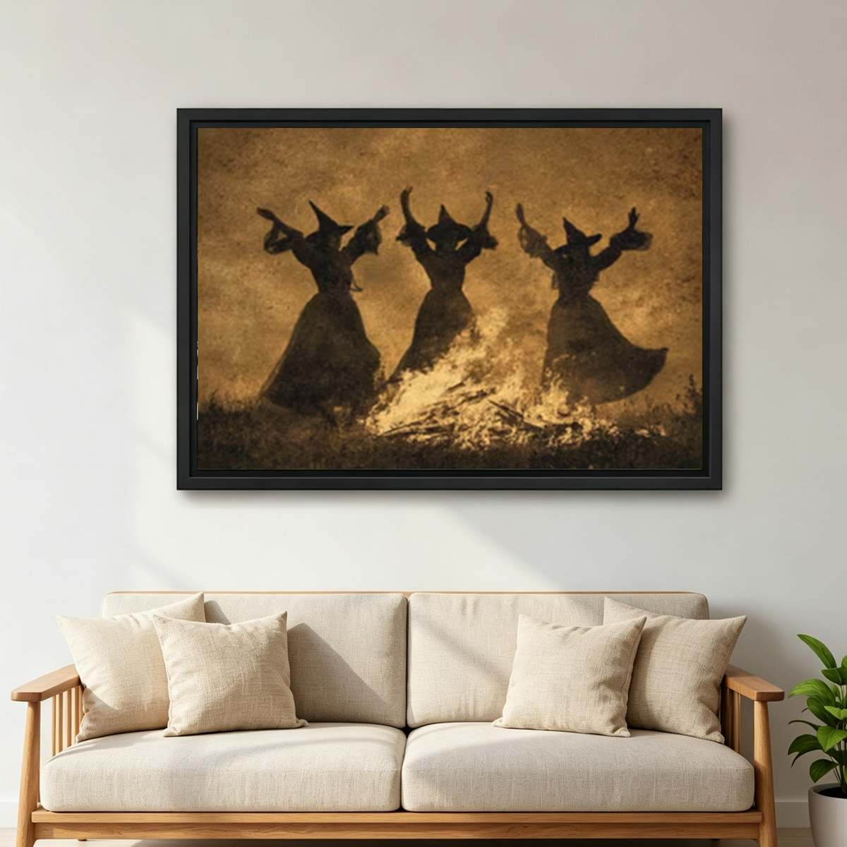 Dancing Witch Rabbits Canvas Wall Art framed above a cream sofa with wooden arms.