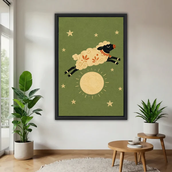 Moon Sheep Canvas Wall Art framed above a wood table with green plants.