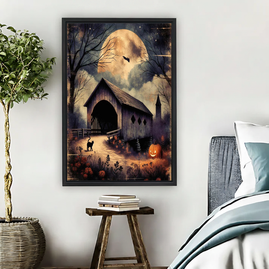 Moonlit Bridge Canvas Wall Art framed beside blue bedding, a leafy plant, and books.