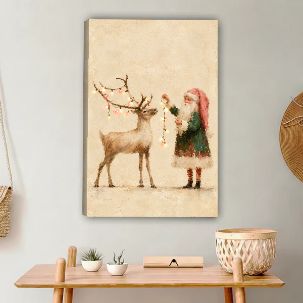 Santa Reindeer Canvas Wall Art unframed above a light wood console and woven basket.
