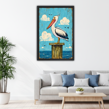 Coastal Pelican Canvas Wall Art framed above a white sofa with blue cushions.