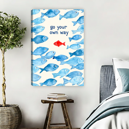 Go Your Way Fish Canvas Wall Art unframed beside a blue bed and wooden book stool.