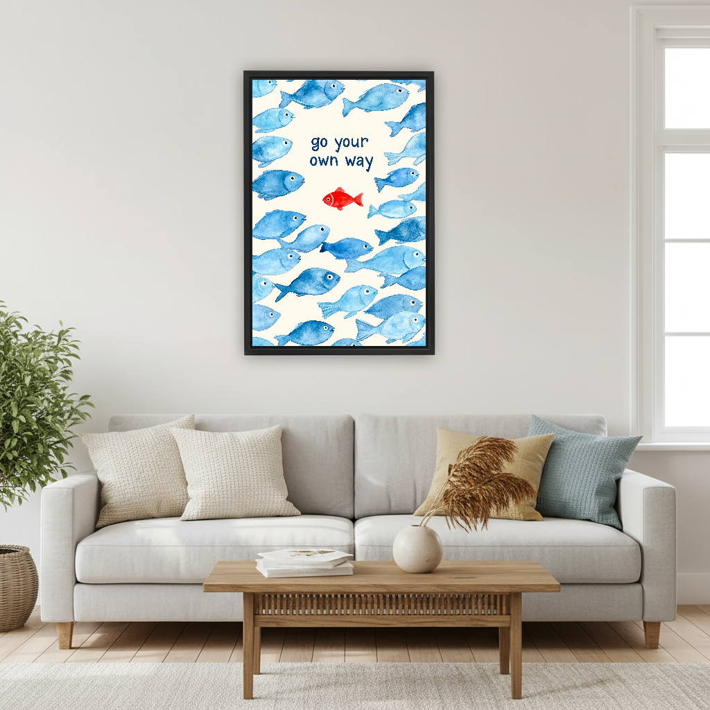 Go Your Way Fish Canvas Wall Art framed above a pale gray sofa and wood coffee table.