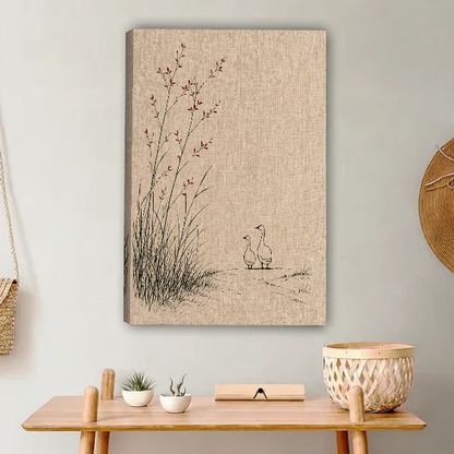 Quiet Geese Reeds Canvas Wall Art unframed above a light wood console and woven basket.