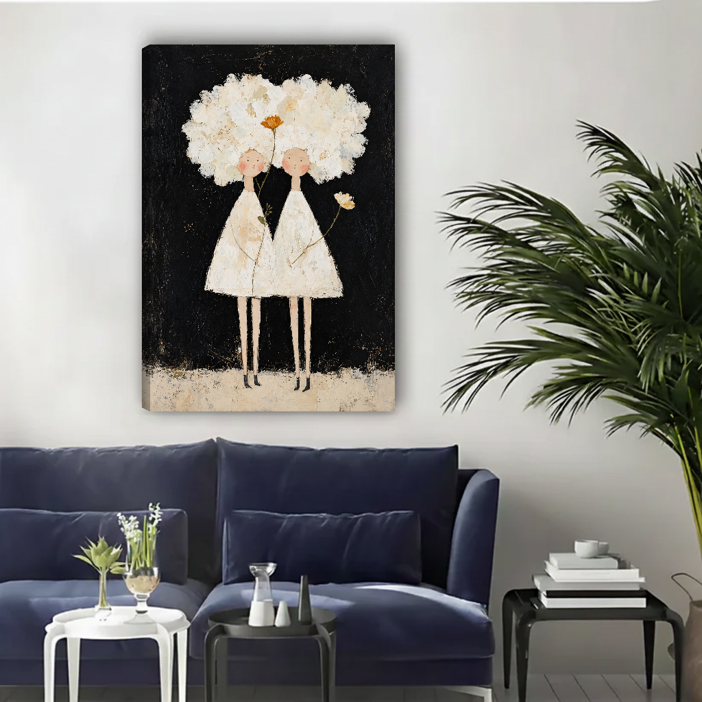 White Flower Girls Canvas Wall Art unframed above a navy sofa with light wall and palm.