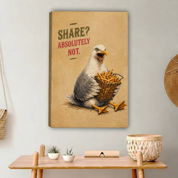 Funny Seagull Fries Canvas Wall Art unframed above a light wood console and woven basket.