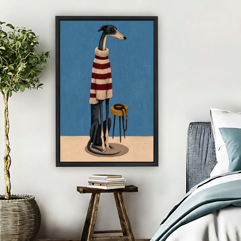 Striped Sweater Greyhound Canvas Wall Art framed beside a blue bed with books and leafy plant.