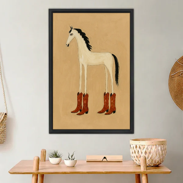 Cowboy Boots Horse Canvas Wall Art framed above a light wood console with cacti.