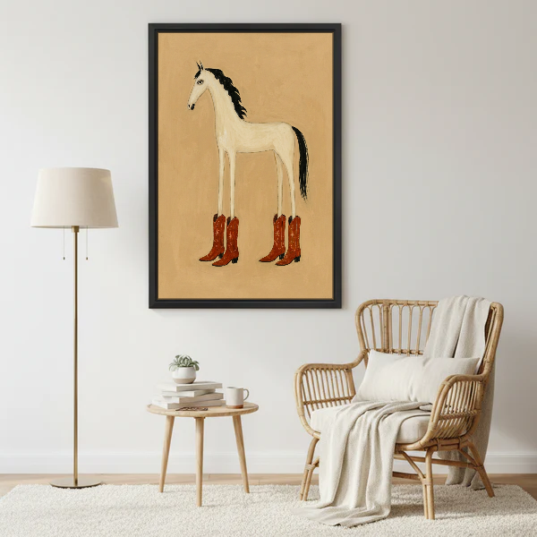 Cowboy Boots Horse Canvas Wall Art framed beside a wicker armchair with floor lamp.