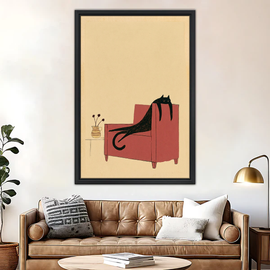 Lounging Chair Cat Canvas Wall Art framed above a brown leather sofa with brass lamp.