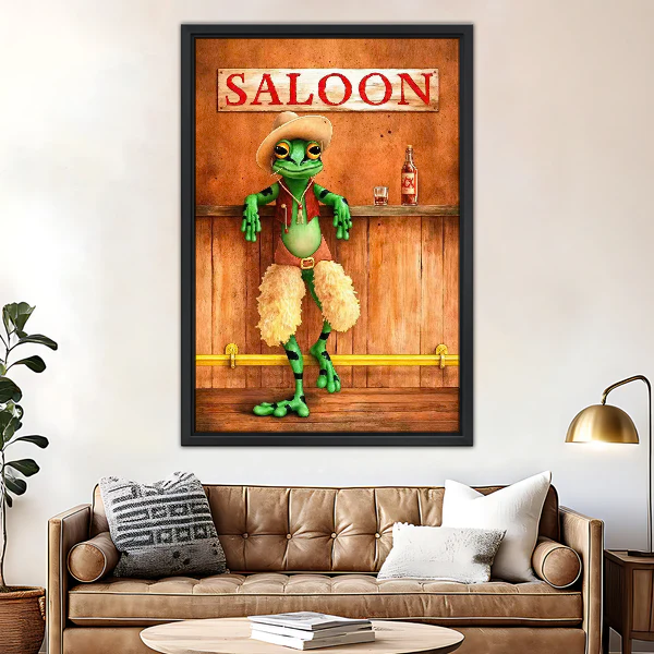 Cowboy Frog Canvas Wall Art framed above a brown leather sofa and brass lamp.