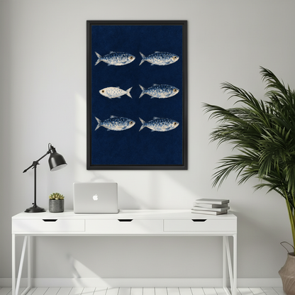 Navy Sardine Canvas Wall Art framed above a white desk with laptop and task lamp.