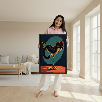 Martini Cat Canvas Wall Art held in a black frame by a woman wearing pink.