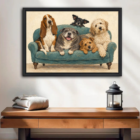 Sofa Dog Friends Canvas Wall Art framed above a wood console with linen and lantern.