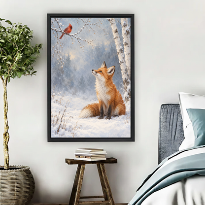 Winter Fox Cardinal Canvas Wall Art framed beside blue bedding, a leafy plant, and books.
