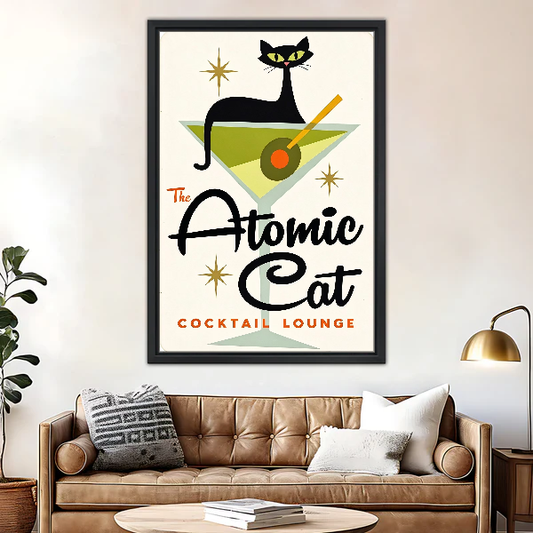 Atomic Cat Cocktail Canvas Wall Art framed above a brown leather sofa and brass lamp.