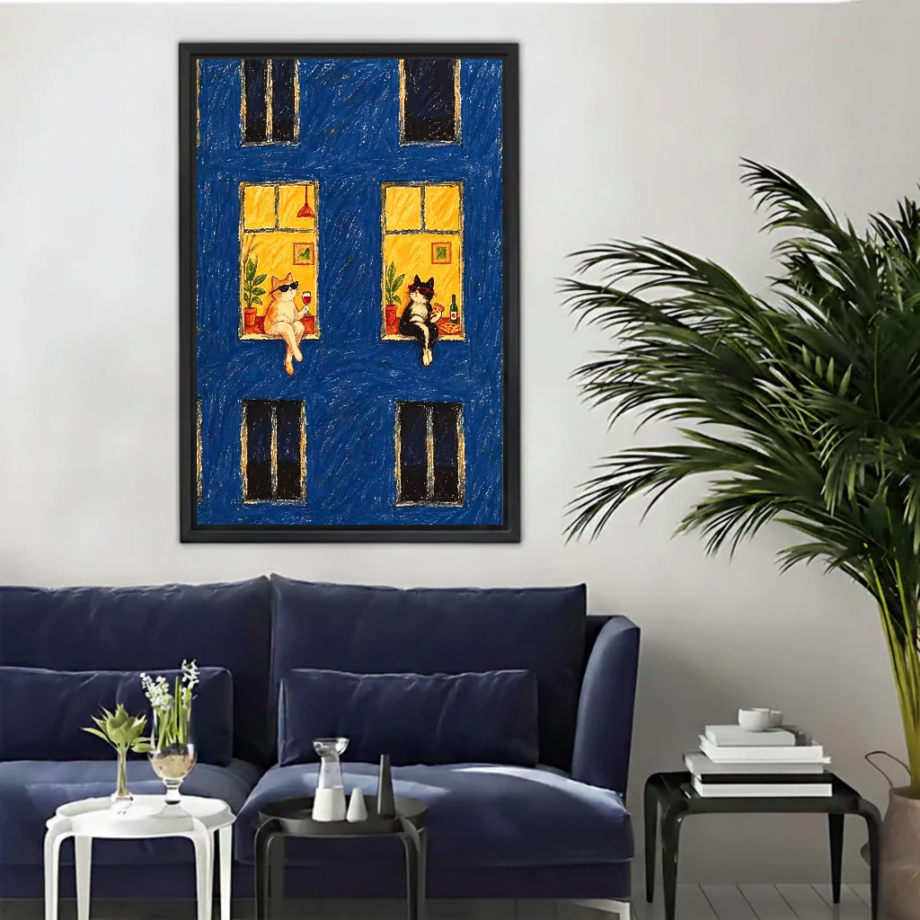 Midnight Window Cats Canvas Wall Art framed above a navy sofa with palm and side tables.