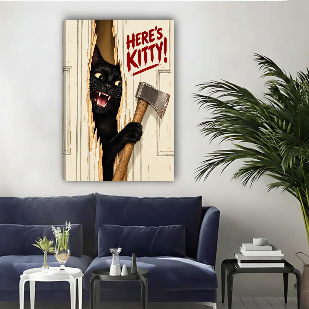 Heres Kitty Black Cat Canvas Wall Art unframed above a navy sofa beside a leafy palm.